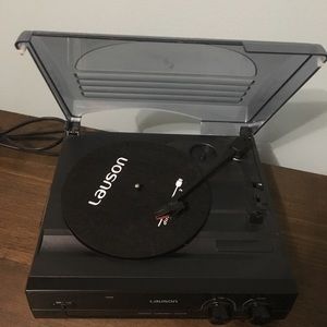 Vinyl vintage style record player. Used once.